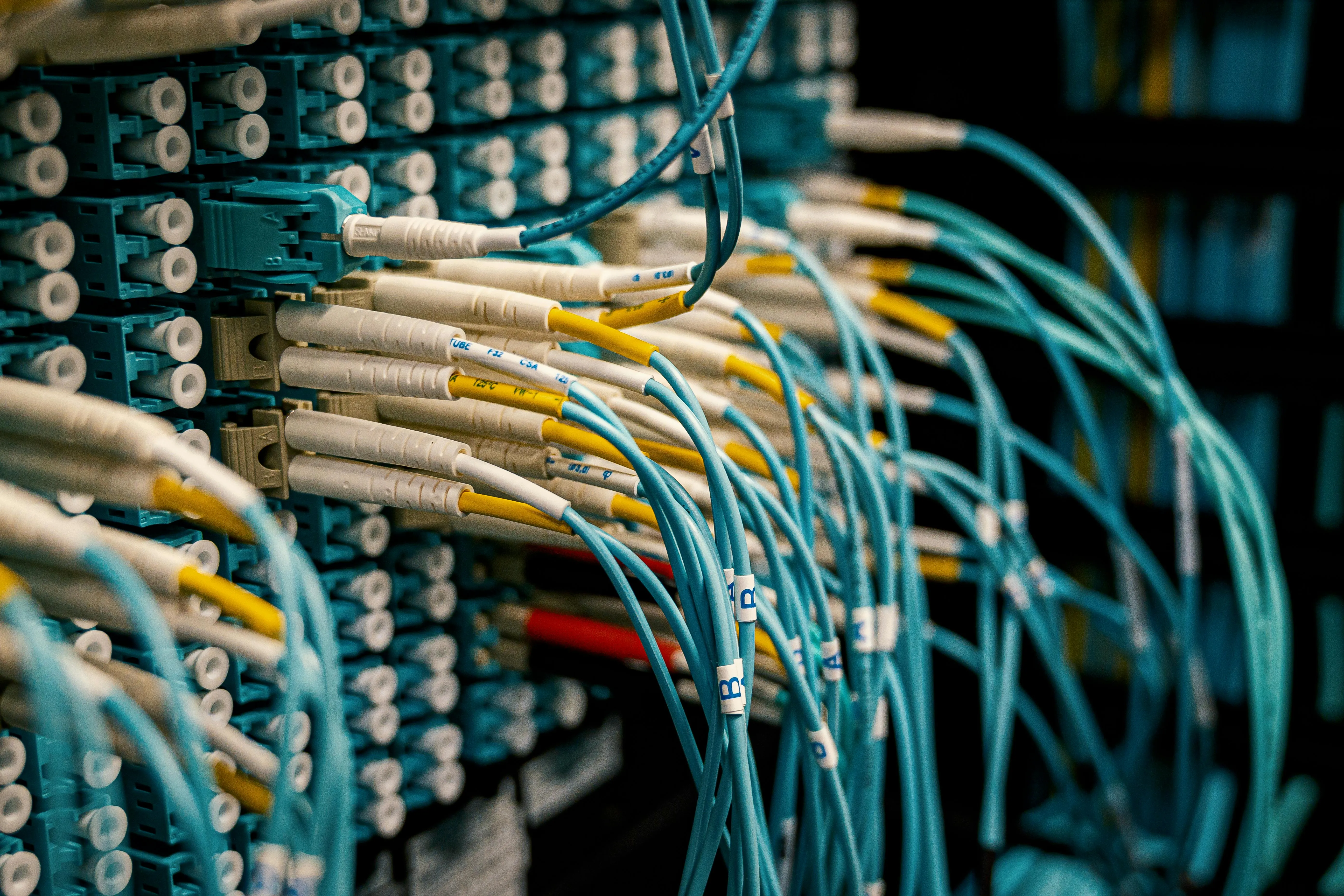 Illuminated fibre optic strands fanning out from a terminated cable